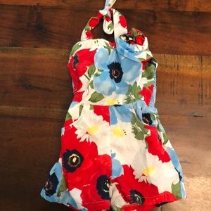 Blue red and white baby romper in new condition.